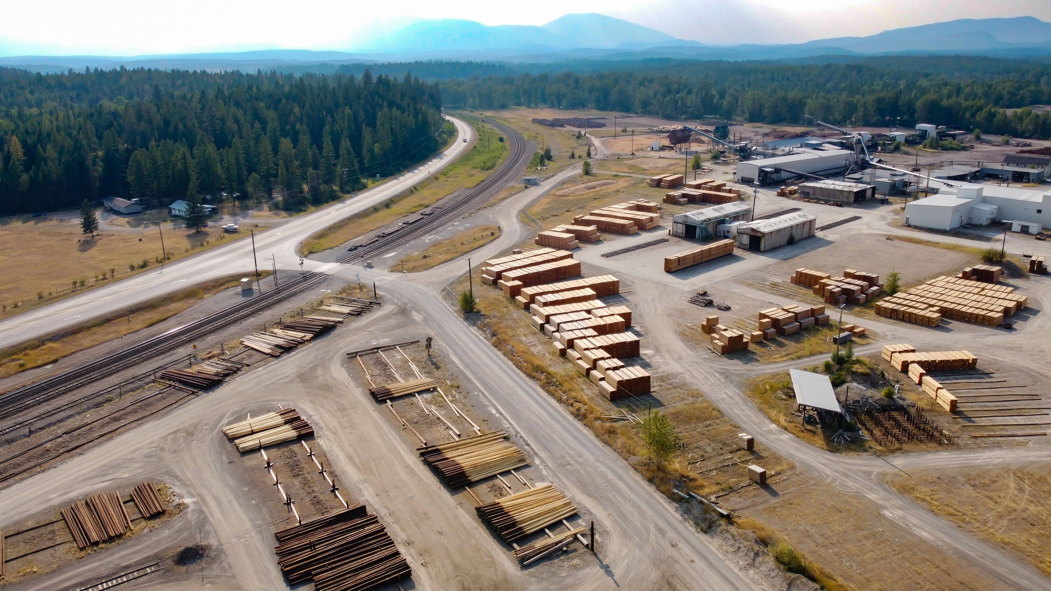 Lumber yard inventory and building materials staged for contractor pickup and delivery