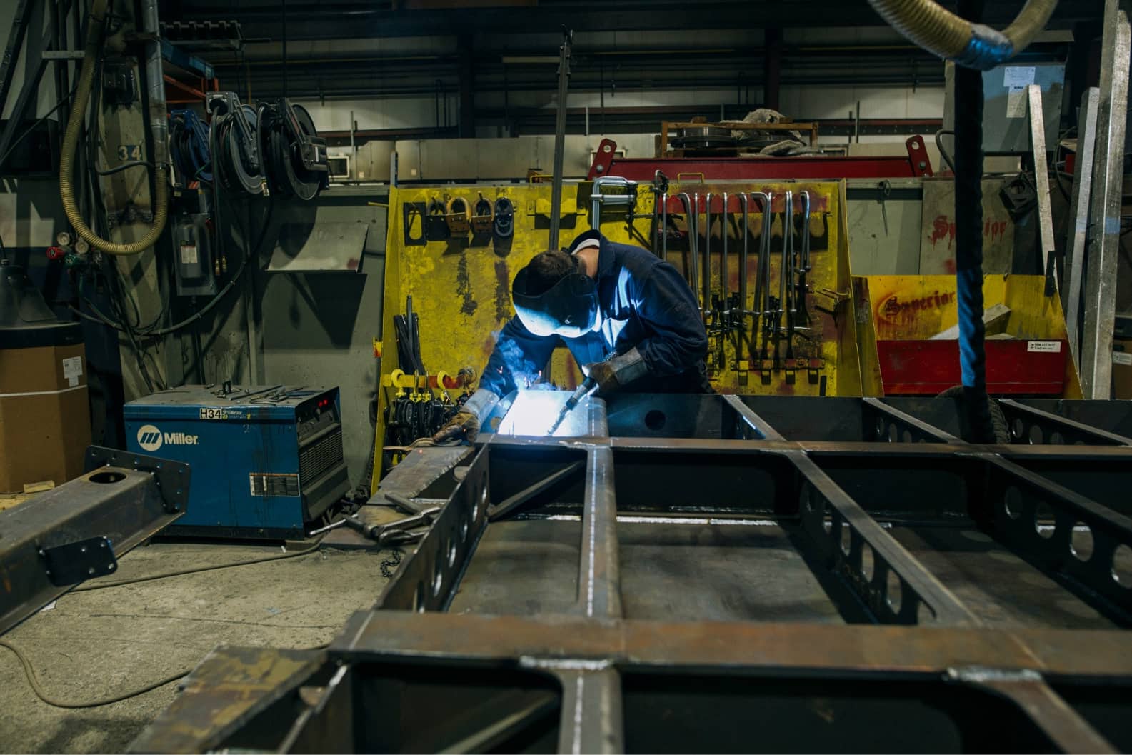 Machine shop floor with CNC equipment, tools, and industrial metalworking capacity